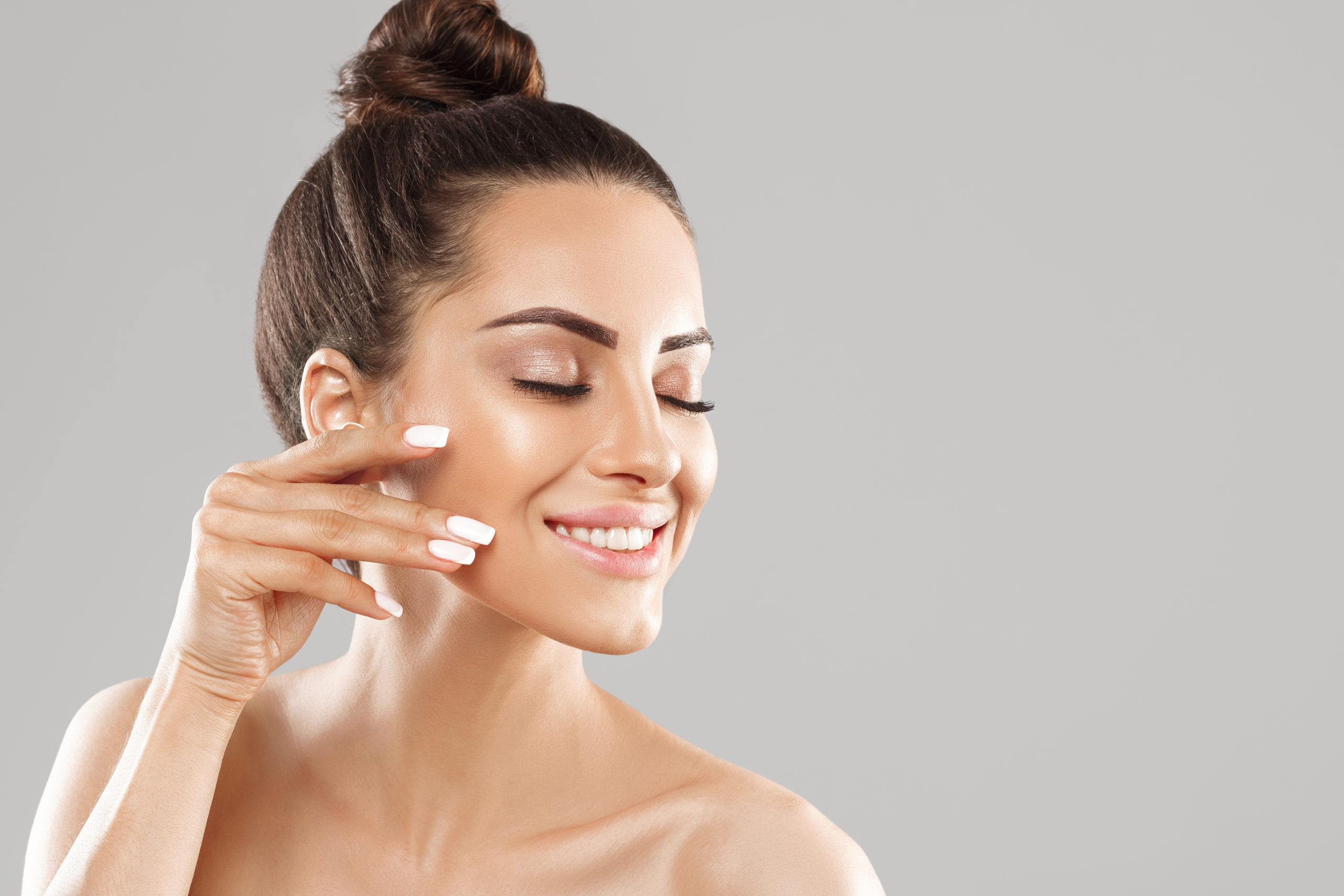 Woman with beautiful skin tone after Ultherapy.